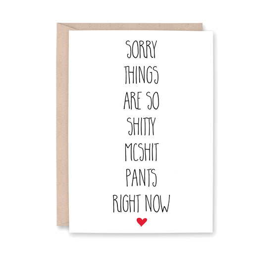 Greeting card with blue text that says, "sorry things are so shitty mcshit pants right now"