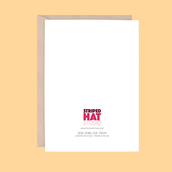 Back side of card with 'Striped Hat Studio' logo on a yellow background