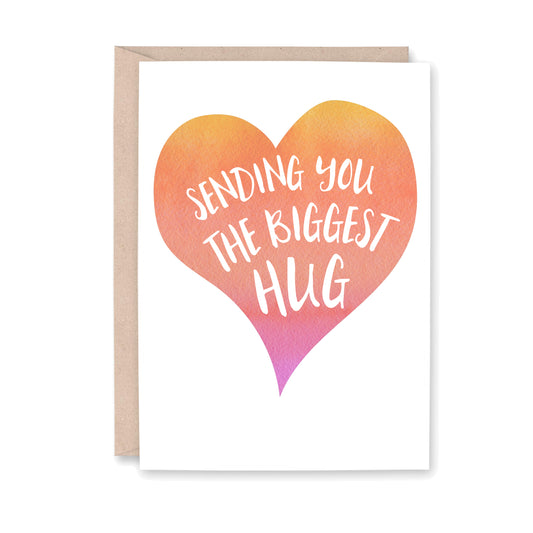 Greeting card with a orange and pink watercolor heart with white text that reads "sending you the biggest hug"